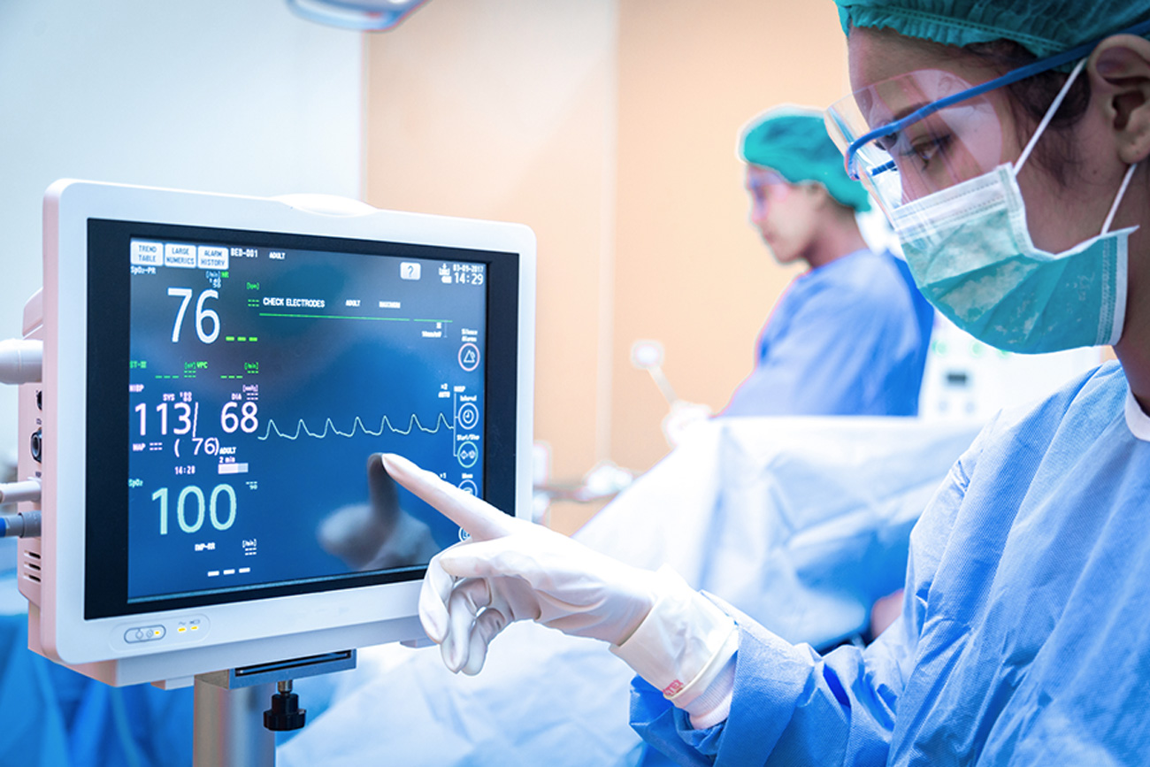 Anesthesiologist Reading ECG Chart